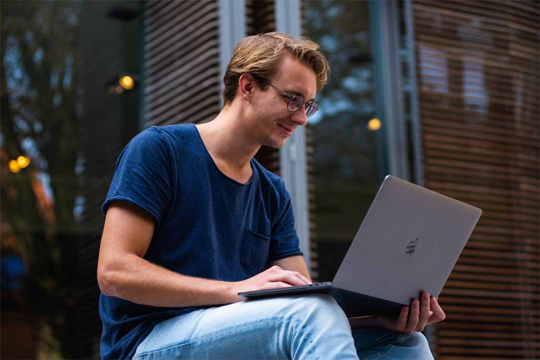 Man using a laptop.